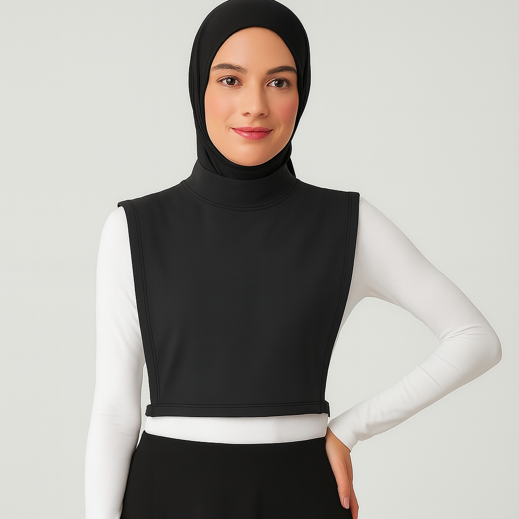 Uzun kolluk ve tesettür boyunluk ile tamamlanan minimalist kombin