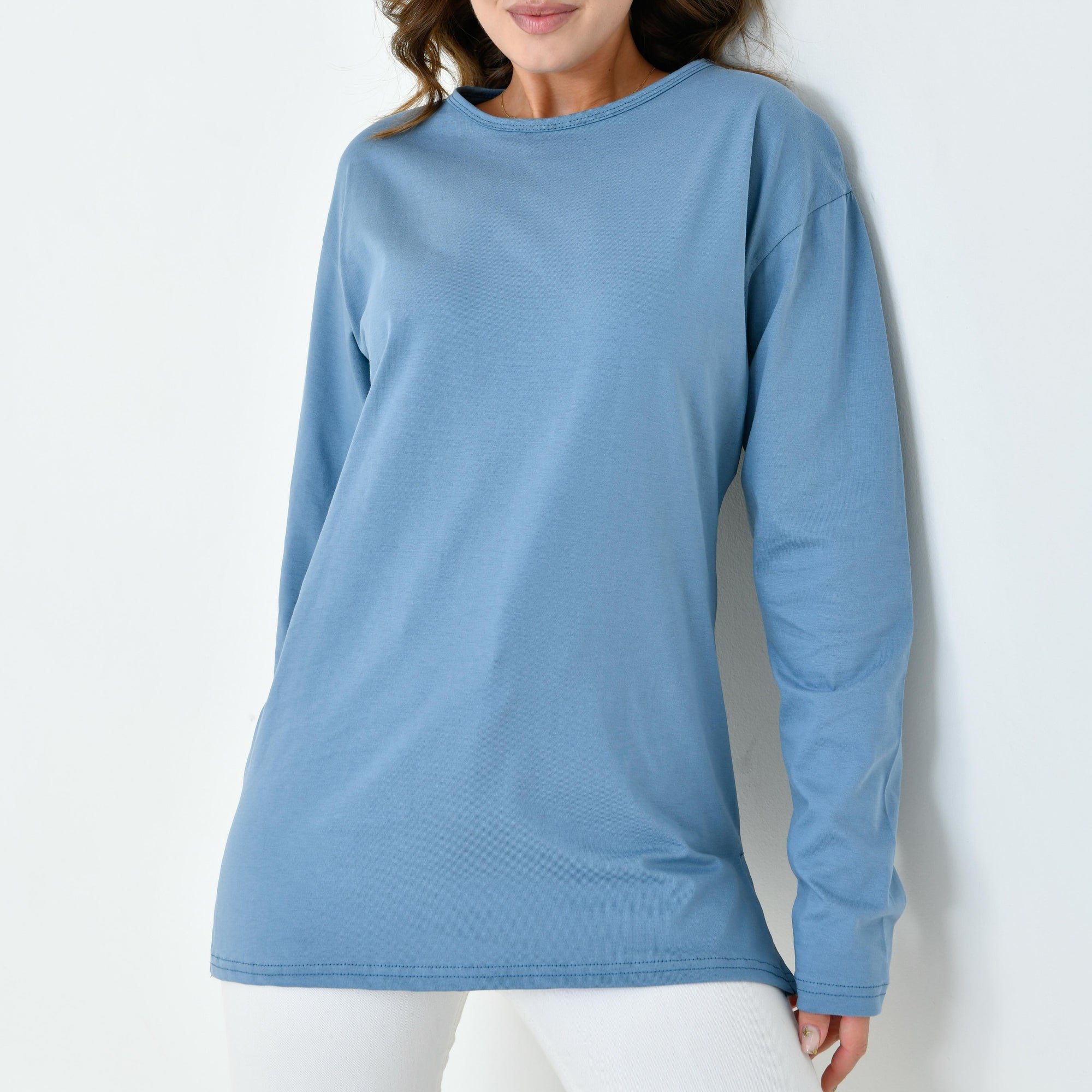 Tunik modelleri tesettür stilinde modern kesim uzun tunik tasarımı